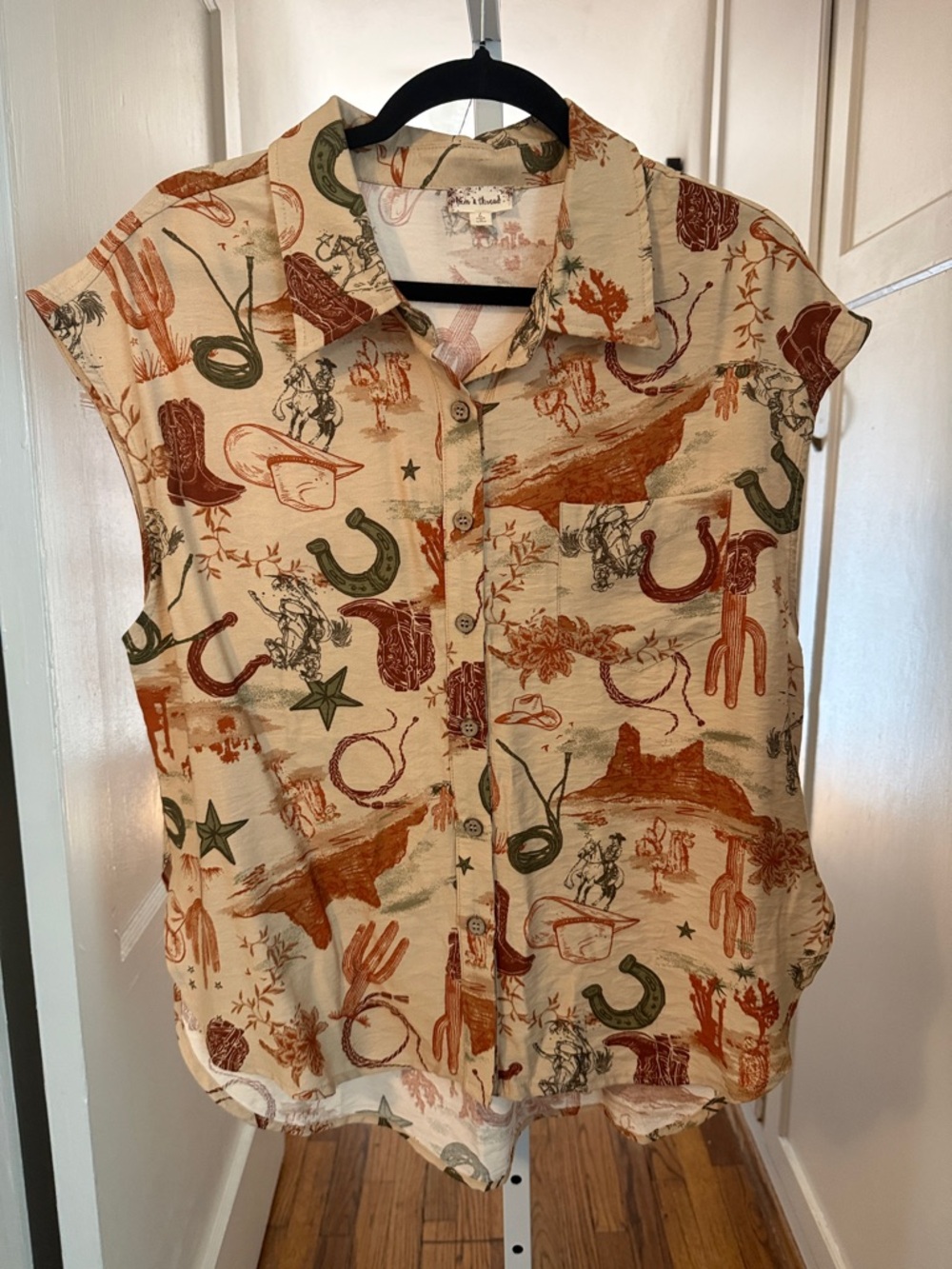 Hem & Thread Cowboy themed sleeveless button down shirt blouse